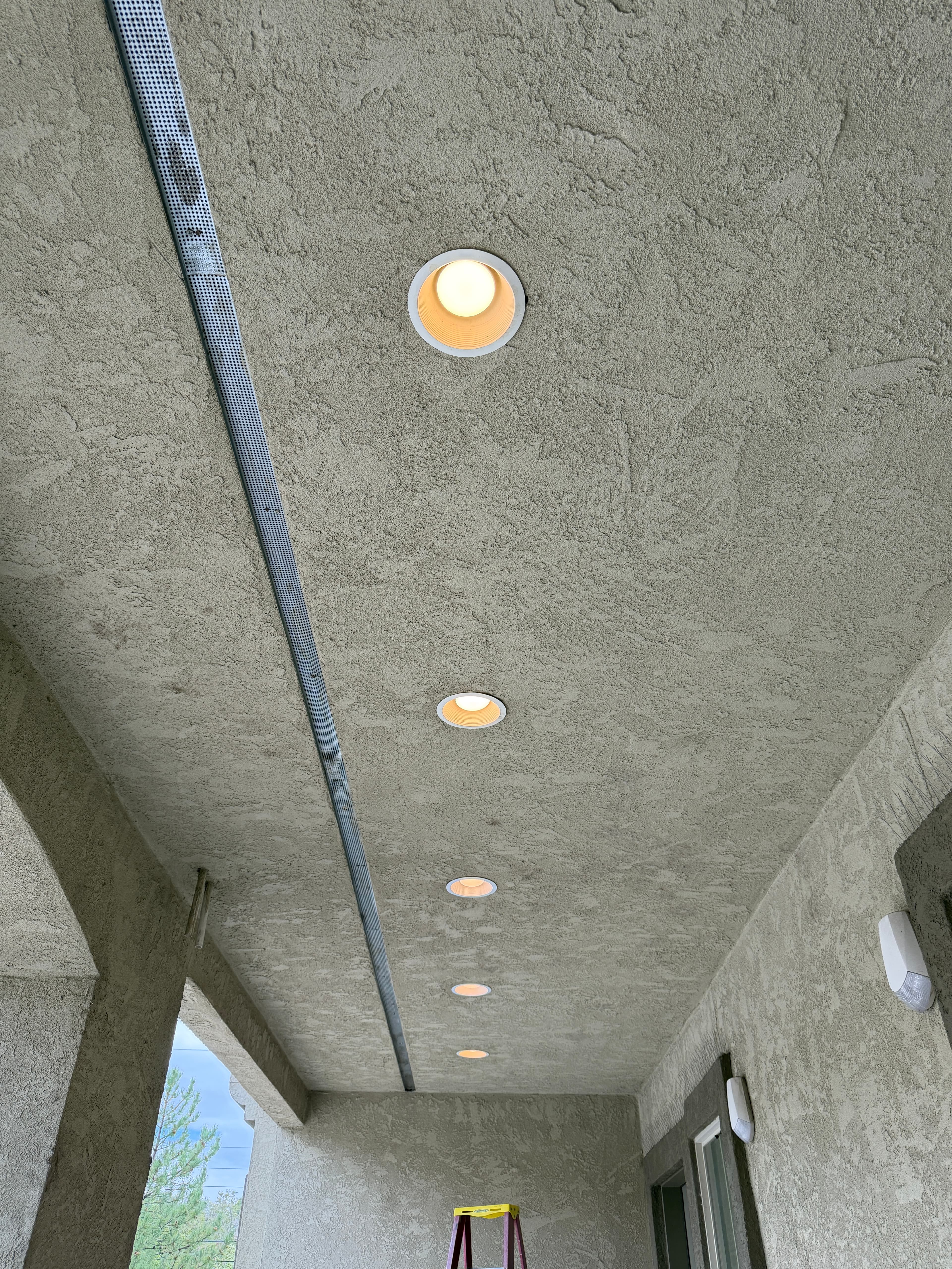 Commercial exterior lighting maintenance with matched color temperature and brightness at a West Reno property near Caughlin Ranch