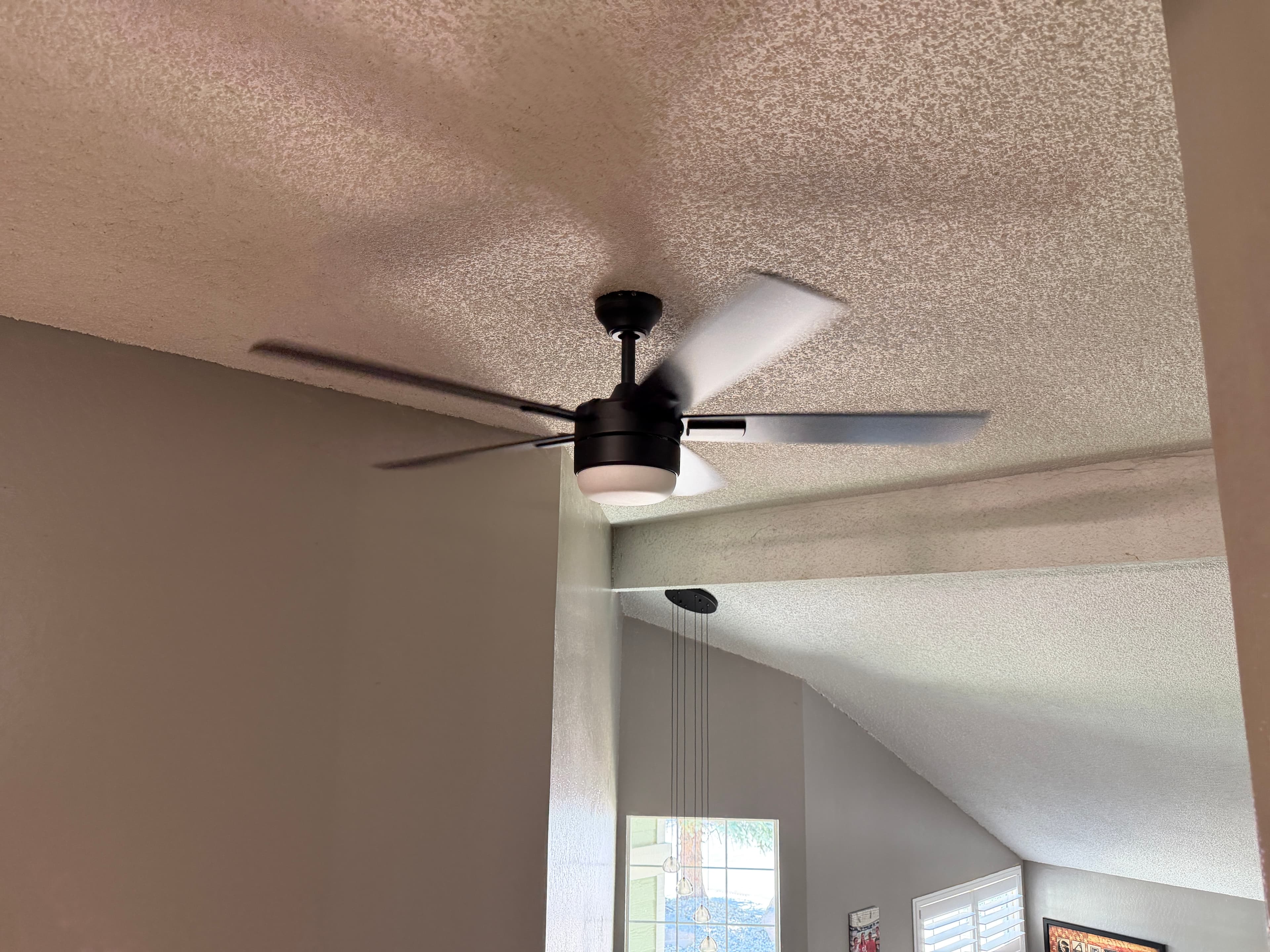 Before and after whole-home lighting fixture and ceiling fan upgrades completed in Reno, Nevada