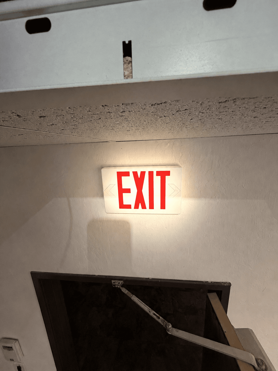 Commercial exit sign troubleshooting and electrical wiring repair completed in Reno, Nevada