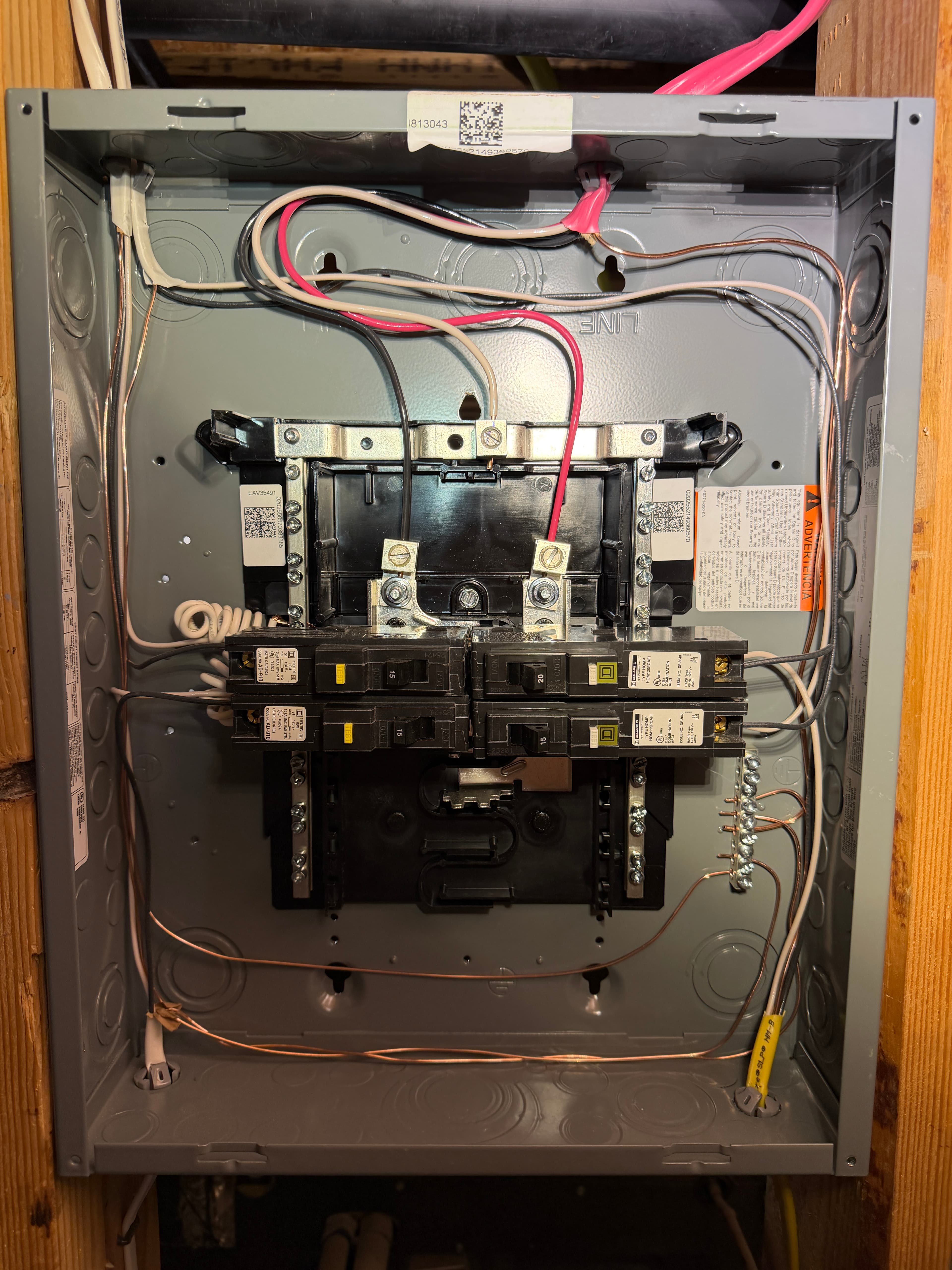 Before and after exposed live wiring repair converted into a new 40 amp basement subpanel with dedicated circuits in ArrowCreek, Reno